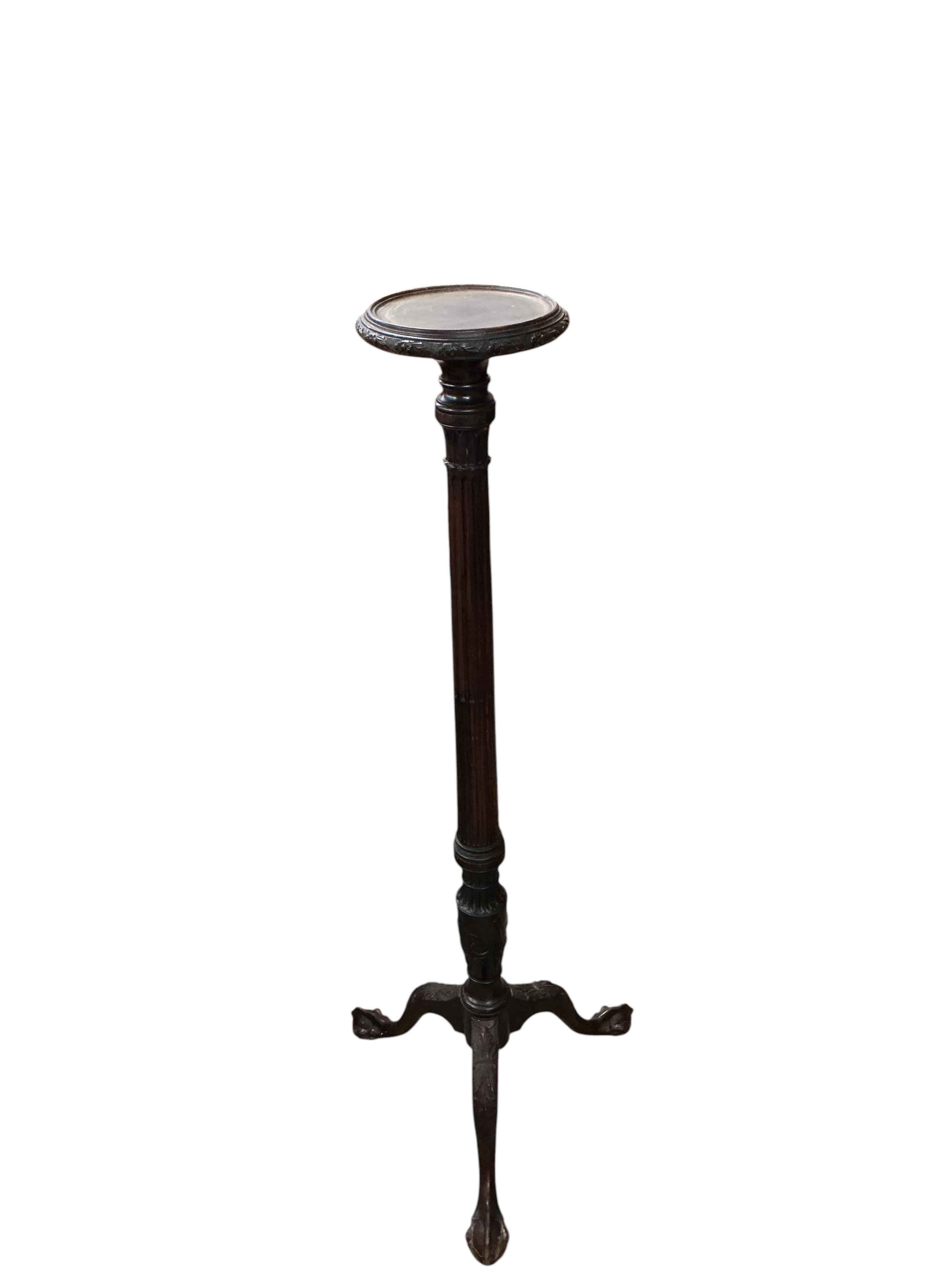 An early 20th century Chippendale Revival mahogany torchere, height 146cm